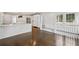 Bright kitchen with white island, counters and hardwood floors at 420 Argonne Nw Dr, Atlanta, GA 30305