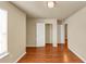 Bright bedroom featuring hardwood floors and a walk-in closet providing ample storage space at 363 Lobdale Falls Dr, Lawrenceville, GA 30045