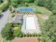Aerial view of community pool, tennis courts, and clubhouse at 363 Lobdale Falls Dr, Lawrenceville, GA 30045