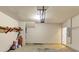 Functional garage space featuring overhead storage and room for your projects at 363 Lobdale Falls Dr, Lawrenceville, GA 30045