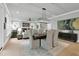 Dining area with view into the living room, offers a comfortable and inviting space at 3745 Pilgrim Mill Rd, Cumming, GA 30041