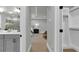 The hallway presents doorways to the bathroom, bedroom, and a white, well-lit closet at 3745 Pilgrim Mill Rd, Cumming, GA 30041