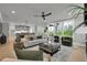 Bright, open-concept living space with comfortable seating, and a view of the dining area and kitchen at 3745 Pilgrim Mill Rd, Cumming, GA 30041