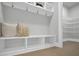 Mudroom with bench seating and shelves and access to the pantry at 3745 Pilgrim Mill Rd, Cumming, GA 30041