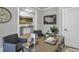 Home office with glass-top desk, decor, seating and a large clock on the wall at 3745 Pilgrim Mill Rd, Cumming, GA 30041