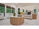 Cozy living space with hardwood floors, a stylish coffee table, and comfortable seating arrangement at 3780 Tamiami Trl, Cumming, GA 30041