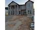 Handsome two-story home with an impressive facade, showcasing brickwork and large windows for natural light at 157 Shadburn Ferry Rd, Buford, GA 30518