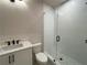 A bathroom with white subway tile and a glass shower door is shown at 160 Chiswick Cir, Alpharetta, GA 30009