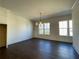 Dining room featuring a modern light fixture and large windows at 160 Chiswick Cir, Alpharetta, GA 30009