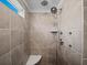 Large walk-in shower with multiple shower heads and built-in seat at 962 Rittenhouse Way, Atlanta, GA 30316