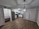 Modern kitchen with stainless steel appliances, granite countertops, and ample cabinet space at 6500 Wellington Chase Ct, Lithonia, GA 30058