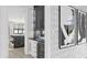 Butler's pantry with dark cabinetry and wine fridge at 1276 A Rutledge Rd, Acworth, GA 30101