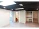 Finished basement featuring multiple rooms and a kitchenette at 2068 Lakewood Cir, Grayson, GA 30017