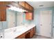 Double vanity bathroom with light blue walls at 2068 Lakewood Cir, Grayson, GA 30017