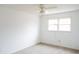 Simple bedroom with carpeted floor and large window at 2068 Lakewood Cir, Grayson, GA 30017