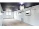 Spacious bonus room with gray carpet, black ceiling, and unique lighting at 2068 Lakewood Cir, Grayson, GA 30017