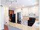 Kitchen with granite countertops and white cabinets at 2068 Lakewood Cir, Grayson, GA 30017