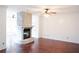 Hardwood floors and a stone fireplace are featured at 2068 Lakewood Cir, Grayson, GA 30017