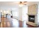 Spacious living room with hardwood floors and stone fireplace at 2068 Lakewood Cir, Grayson, GA 30017