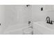 All white bathroom featuring a shower-tub combo, toilet and modern vanity at 951 Lawton Sw St, Atlanta, GA 30310
