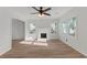 This living room features a fireplace and many windows that let in natural light at 951 Lawton Sw St, Atlanta, GA 30310