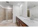 Bathroom with a double sink vanity and a separate glass door shower at 3269 Durston Ct, Dacula, GA 30019