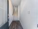 Hallway showcasing modern stairs and plank flooring at 3269 Durston Ct, Dacula, GA 30019