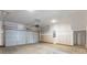 Spacious two-car garage with concrete flooring and ample room for parking and storage at 3269 Durston Ct, Dacula, GA 30019