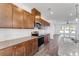 Modern kitchen with stainless steel appliances, granite counters, and stylish wood cabinets at 3269 Durston Ct, Dacula, GA 30019