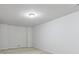 Spacious basement with neutral carpet, a simple light fixture, and potential for customization at 2420 Bronze Ct, Cumming, GA 30041