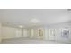 Unfinished basement with neutral paint, carpet, and ample space for customization and storage at 2420 Bronze Ct, Cumming, GA 30041