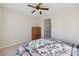 Comfortable bedroom offers great natural light and a ceiling fan to keep you cool at 2420 Bronze Ct, Cumming, GA 30041
