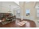 Bright dining room with hardwood floors, and a chandelier at 2420 Bronze Ct, Cumming, GA 30041