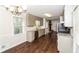 Updated kitchen featuring modern appliances, granite countertops, and ample cabinet space at 407 Robins Nest Ct, Woodstock, GA 30189