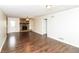 Spacious living room with a stone fireplace and wood-look flooring at 407 Robins Nest Ct, Woodstock, GA 30189