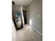 Utility room with an upgraded water heater and hexagon tile flooring at 1905 Robinhill Ct, Tucker, GA 30084