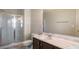 Bathroom with double vanity and shower at 4262 Buford Valley Way, Buford, GA 30518