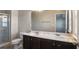 Bathroom with double vanity and shower at 4262 Buford Valley Way, Buford, GA 30518