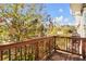 Wooden deck overlooking trees and houses at 4262 Buford Valley Way, Buford, GA 30518