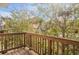 Wooden deck overlooking trees and houses at 4262 Buford Valley Way, Buford, GA 30518