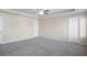 Spacious bedroom with neutral walls and carpet at 4262 Buford Valley Way, Buford, GA 30518