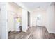 Laundry room with a water heater, built-in shelving, and vinyl flooring at 2686 Horseshoe Bend Rd, Marietta, GA 30064