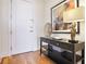 Inviting entryway with a stylish console table, decorative accents, and a door at 3630 Peachtree Ne Rd # 2305, Atlanta, GA 30326