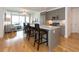 Open-concept kitchen with granite island and stainless steel appliances, seamlessly integrated with the living area at 3630 Peachtree Ne Rd # 2305, Atlanta, GA 30326