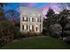 Stunning two-story home with grand columns and lush landscaping at 61 Alden Nw Ave, Atlanta, GA 30309