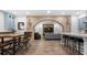 Modern living room with brick archway, bar seating, and sleek decor at 61 Alden Nw Ave, Atlanta, GA 30309