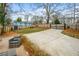 Expansive backyard featuring a large driveway and patio at 1375 Miller Reed Se Ave, Atlanta, GA 30315