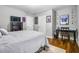 Spacious bedroom featuring hardwood floors, a desk, and decor at 1375 Miller Reed Se Ave, Atlanta, GA 30315