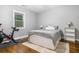 Comfortable bedroom with hardwood floors and a sunny window at 1375 Miller Reed Se Ave, Atlanta, GA 30315