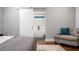 View of the main bedroom featuring a sliding barn door to the bathroom at 1375 Miller Reed Se Ave, Atlanta, GA 30315